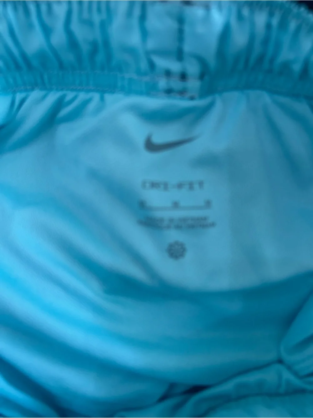 Nike Women's Black Shorts with Light Blue Trim